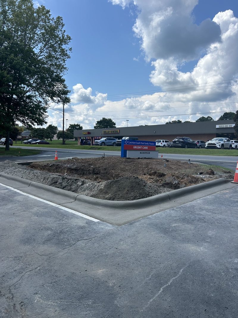 Smooth concrete curb and gutter in commercial parking lot in Gastonia NC
