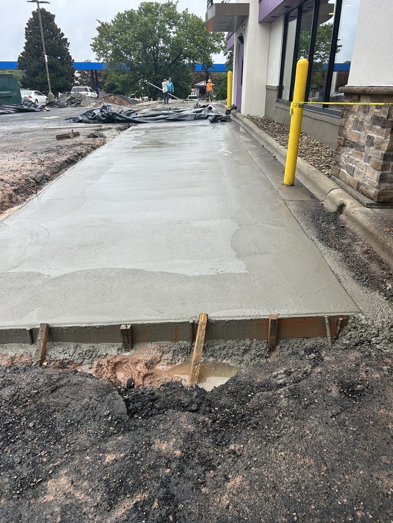 Commercial concrete sidewalk pour in progress in Spartanburg SC