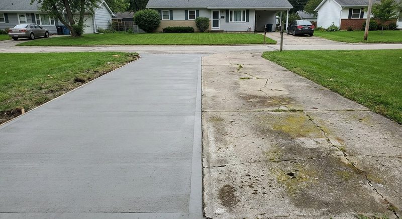 Concrete resurfacing and restoration on aged driveway in South Carolina