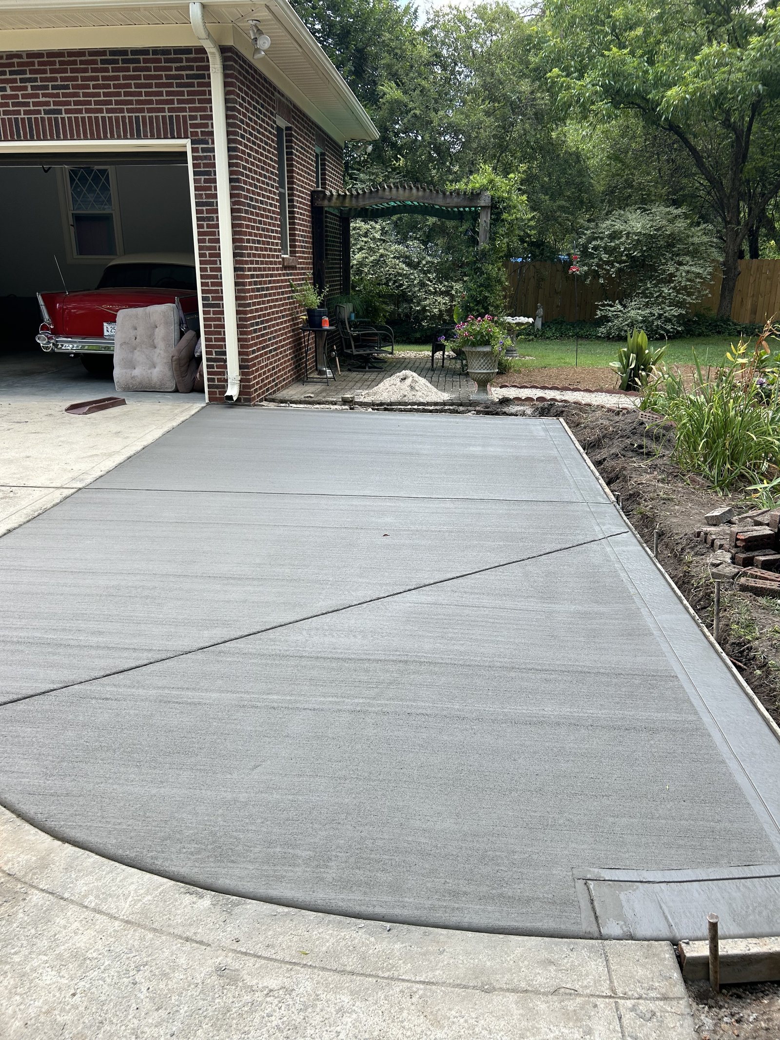 New broom finish concrete driveway installed by Santiz Concrete in Spartanburg SC