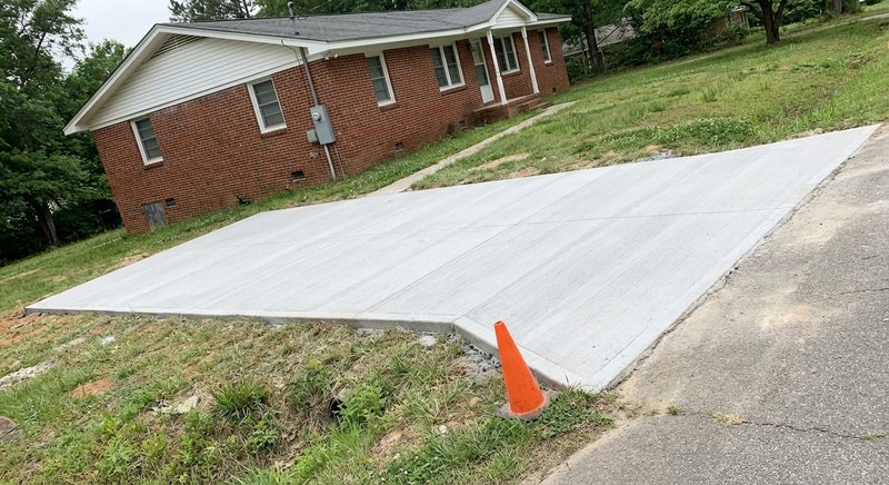 New residential concrete driveway at brick home in Gaffney SC Cherokee County
